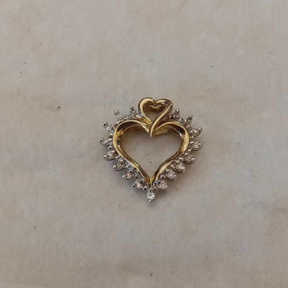 10k Gold and Silver Heart Pendant With 17 Surrounding Diamonds
